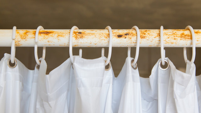 White Shower Curtain In The Bathroom