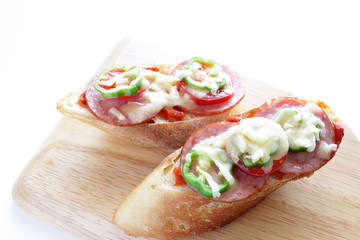 peppr and salami on bread for pizza toast image