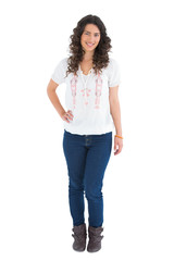 Cheerful attractive brunette wearing casual clothes posing