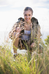 Blonde woman knee down