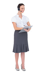 Peaceful call center agent holding clipboard