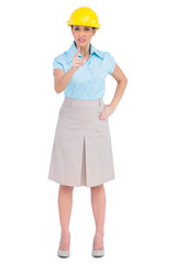 Angry attractive architect pointing at camera