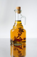 jar with oil isolated on white