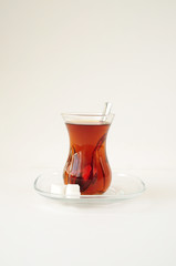 Turkish tea in traditional glass isolated on white background