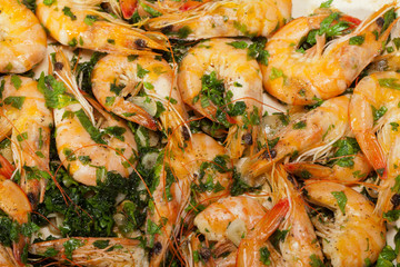 Fried shrimps with the garlic and the parsley