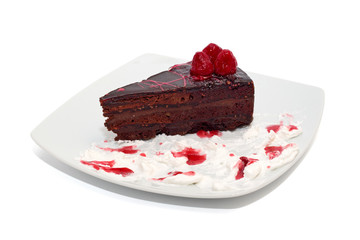 Chocolate cake with raspberry and cream isolated