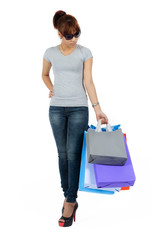 young Asian woman with colorful shopping bags.