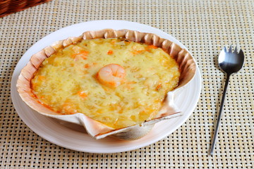 Concha de vieira rellena de marisco