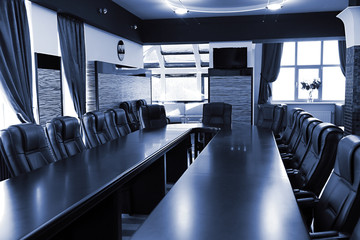 Interior of empty conference room in shades of grey