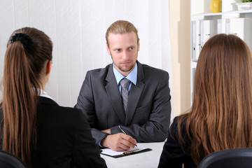 Job applicants having interview