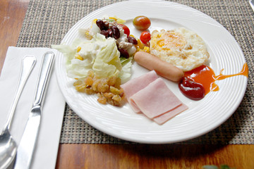 Rice Eggs bacon and toast breakfast.