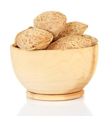 Almond in wooden bowl, isolated on white