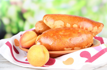 Fresh baked pasties with fruit jam,