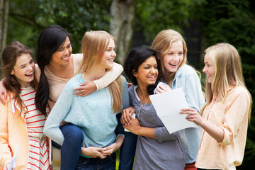 Six Teenage Girls Celebrating Successful Exam Results