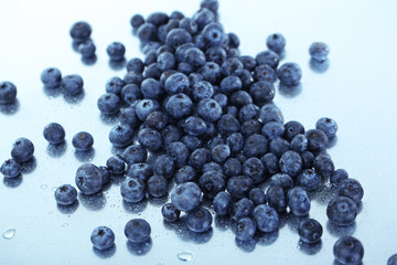 Blueberries on metal background