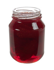 Jar of strawberry syrup with berries isolated on white