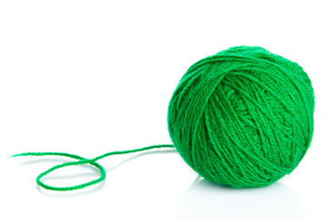 Green wool yarn ball isolated on white  background