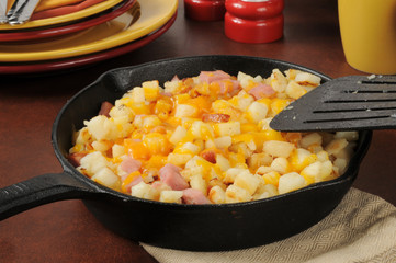 Diced ham and potatoes with cheddar cheese