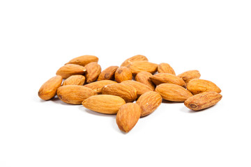 Heap of almond nuts isolated on white background