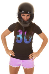 woman pink shorts helmet stand