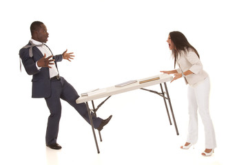 Fototapeta premium woman throw table at man