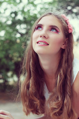 Obraz premium beautiful young girl with long hair and makeup