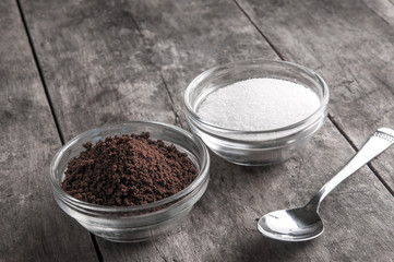 coffee and sugar on wooden table