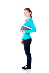 Young caucasian woman (student) with book