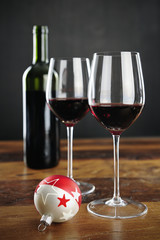 Red wine, bottle and christmas bauble