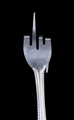 Bent metal fork, one finger sign.