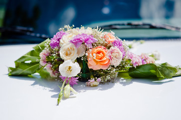 Wedding bouquet of bride lying on table