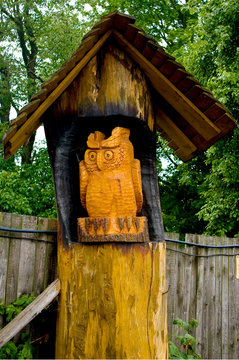 The wooden statue of an owl. Folk Art.