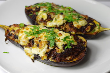 two stuffed aubergines