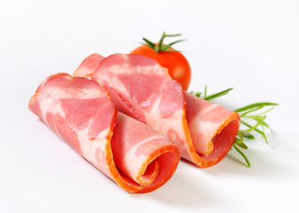 Slices of smoked pork - rolled up