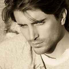 portrait of beautiful man model sepia toned