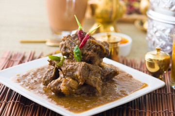 mutton korma famous food with traditional indian background item