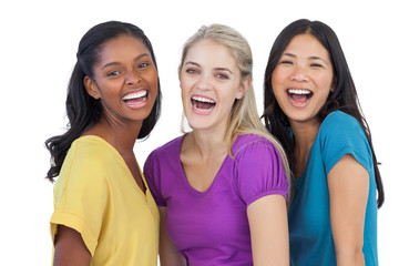 Diverse laughing women looking at camera