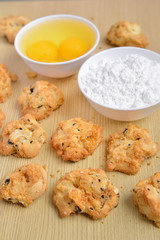 Cereal cookies on a wooden panel with ingredients