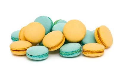 blue and yellow macarons over white