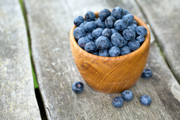 blueberries in a wooden bowl