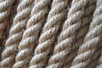 Fototapeta na wymiar Strong twisted hemp rope as background