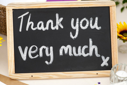 thank you very much message written in chalk on a small blackboa