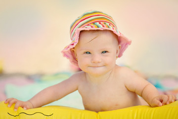 cheerful little baby girl with Downs Syndrome