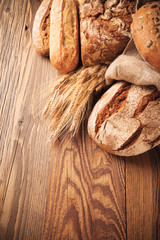 Fresh bread on wood