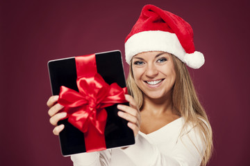 Santa woman with digital tablet gift