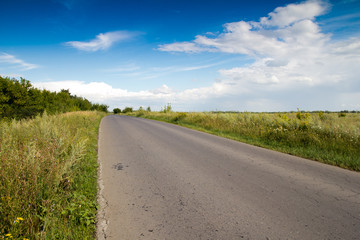 old asphalt road on nature