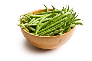 fresh green beans in wooden bowl