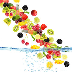Flight of fruits and berries in water