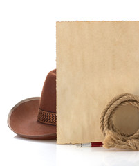aged paper and cowboy hat