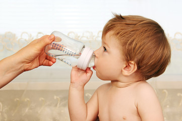 feeding a baby.